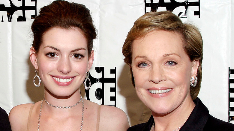 Anne Hathaway and Julie Andrews smiling