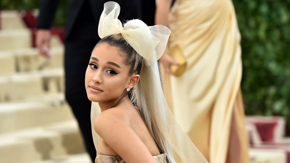 Ariana Grande with a huge cream bow in her hair