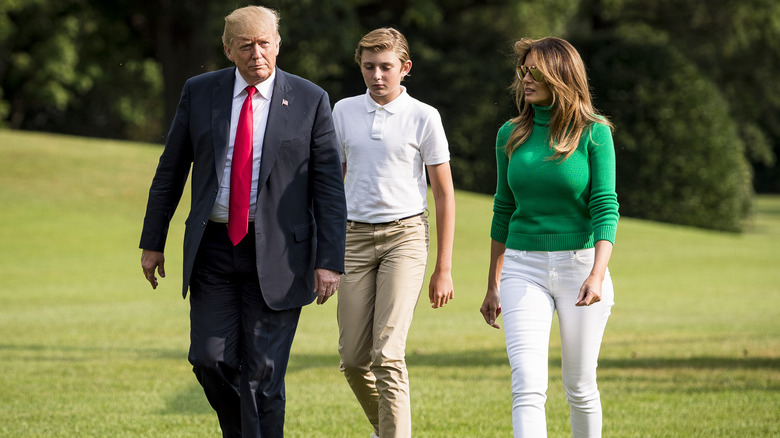 Donald, Melania, and Barron Trump walk the South Lawn 