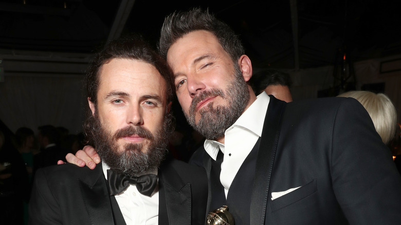 Casey and Ben Affleck celebrating