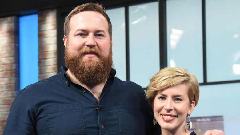 Ben and Erin Napier pose for a picture