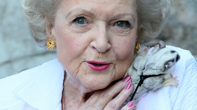 Betty White with an animal