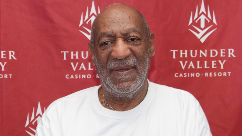 Bill Cosby poses for photos in 2014