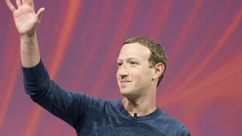 Mark Zuckerberg greets fans at a conference