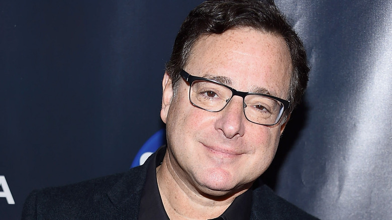 Bob Saget looks at camera