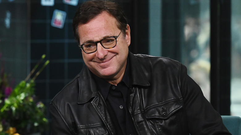 Bob Saget grins