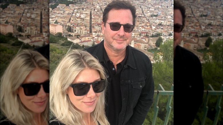 Kelly Rizzo and Bob Saget posing for selfie