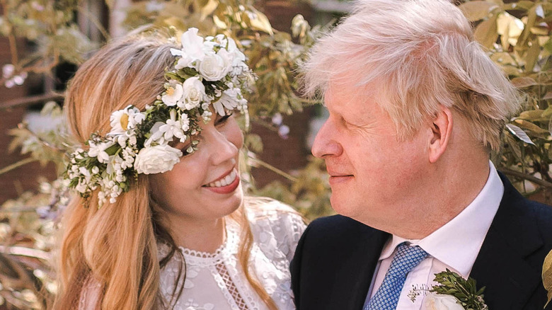 Boris Johnson and Carrie Symonds pose after their wedding