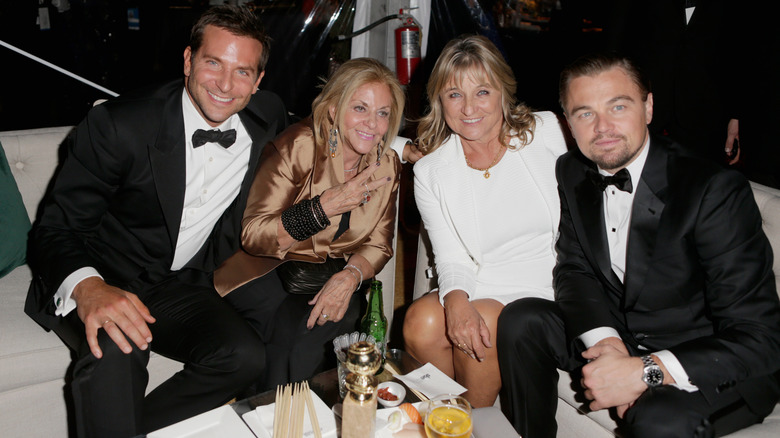 Bradley Cooper and Leonardo DiCaprio pose with their moms