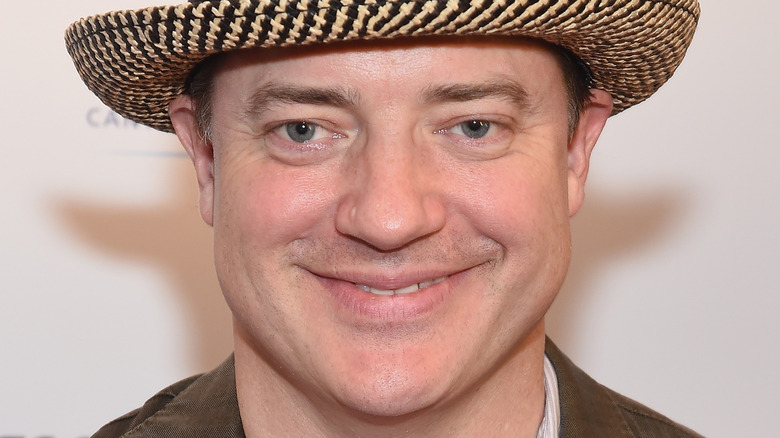 Brendan Fraser smiling straw hat