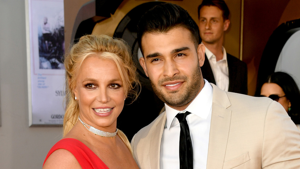 Britney Spears and Sam Asghari smiling