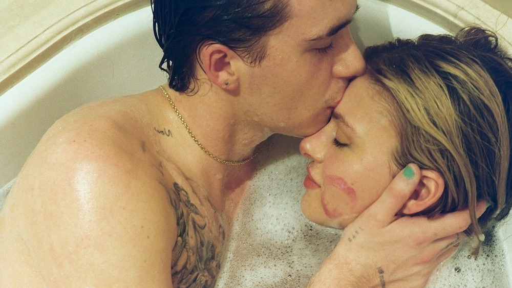 Brooklyn Beckham and Nicola Peltz take a selfie in a bathtub