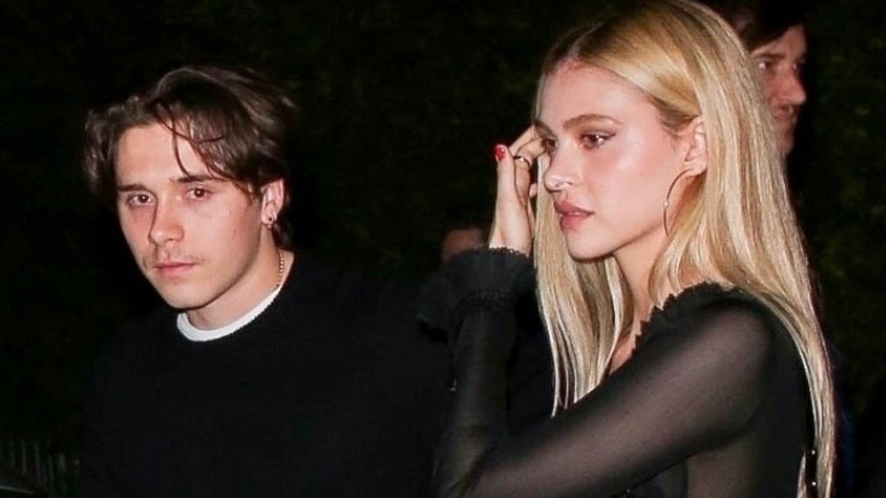 Brooklyn Beckham and Nicola Peltz looking glum