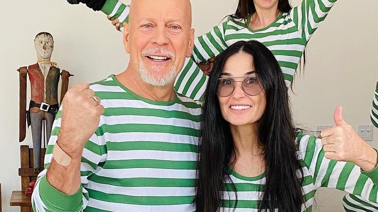 Bruce Willis and Demi Moore in matching outfits