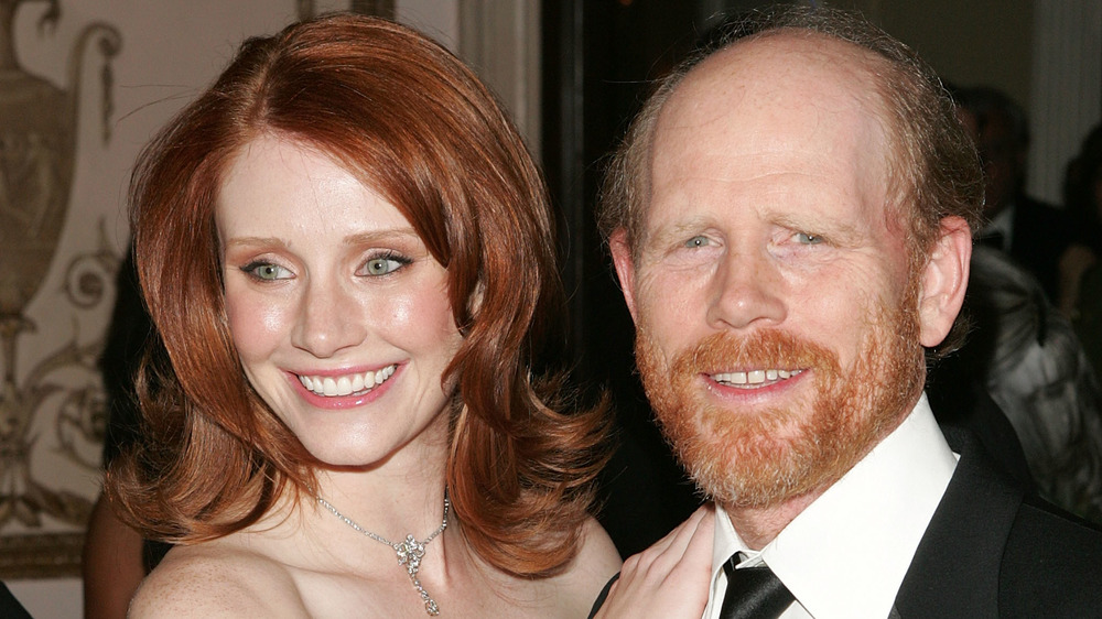 Bryce Dallas Howard smiles with her dad Ron Howard in 2005