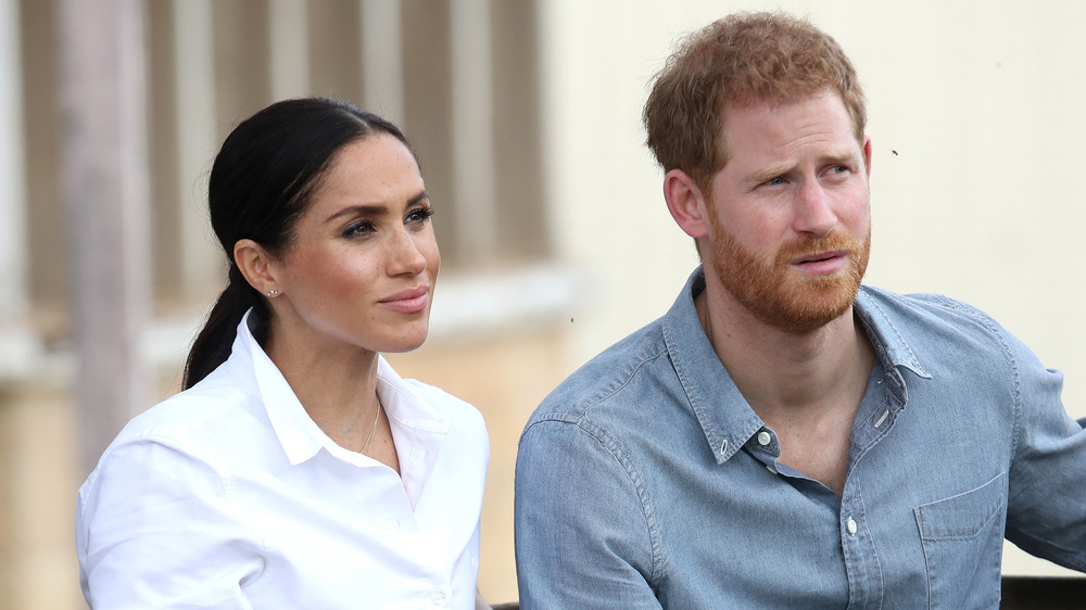 Meghan Markle and Prince Harry looking off camera