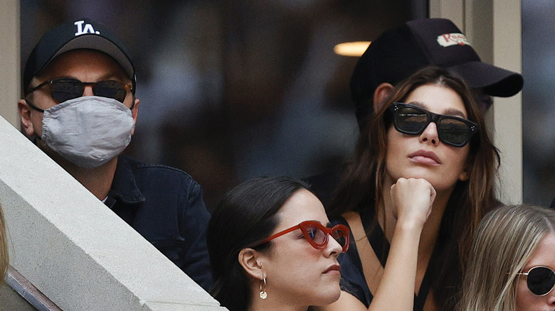 Leonardo DiCaprio and Camila Morrone posing