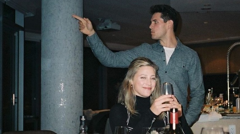 Lili Reinhart and Casey Cott having a wine night