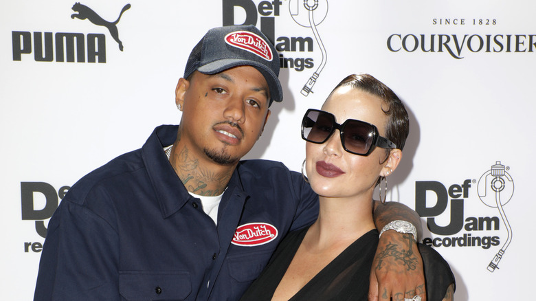 Alexander Edwards wearing hat with Amber Rose