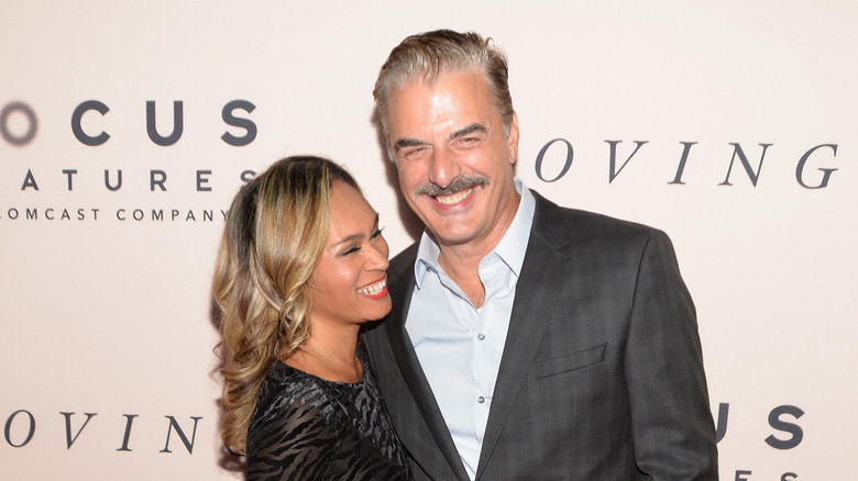 Chris Noth and wife Tara Wilson laughing on the red carpet