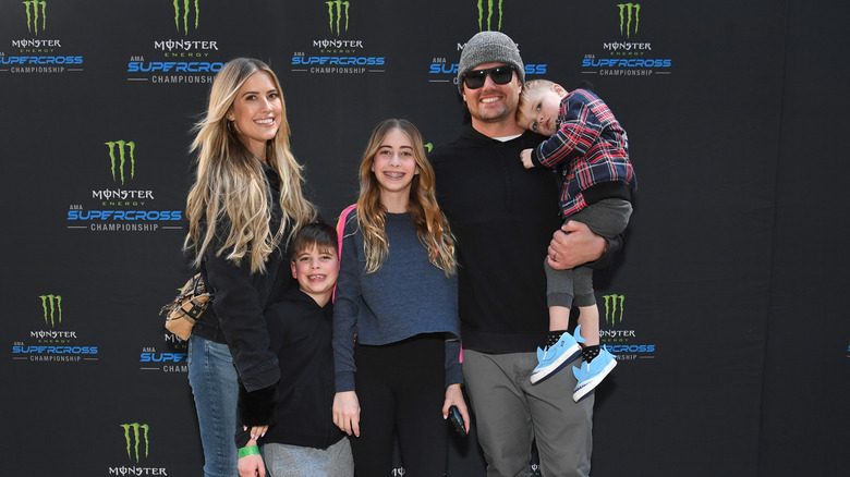 Christina Hall, Josh Hall, and her three children smiling