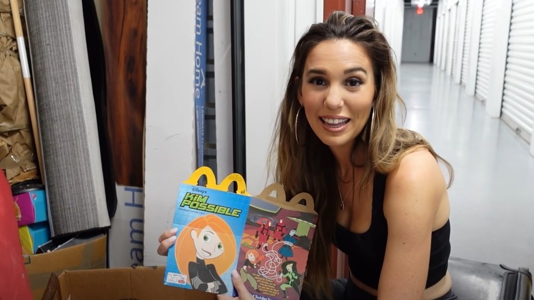 Christy Carlson Romano holding McDonald's Happy Meal box