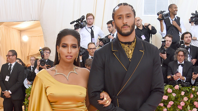 Colin Kaepernick and his girlfriend posing at the Met Gala in 2019