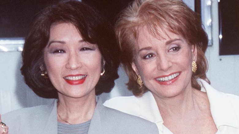 Connie Chung and Barbara Walters pose together on the red carpet