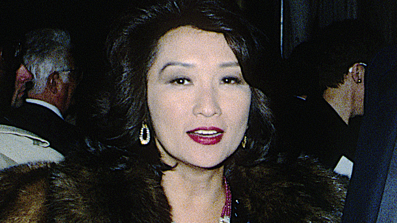 Connie Chung wears a fur coat