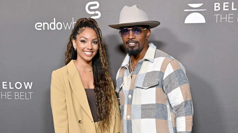 Corinne and Jamie Foxx posing together 