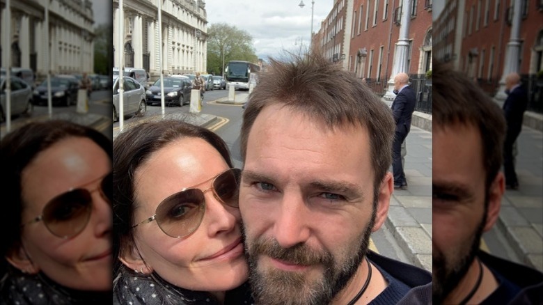 Courteney Cox and Johnny McDaid take selfie on street
