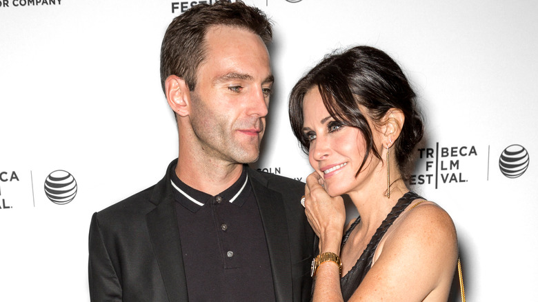 Johnny McDaid gazes at Courteney Cox