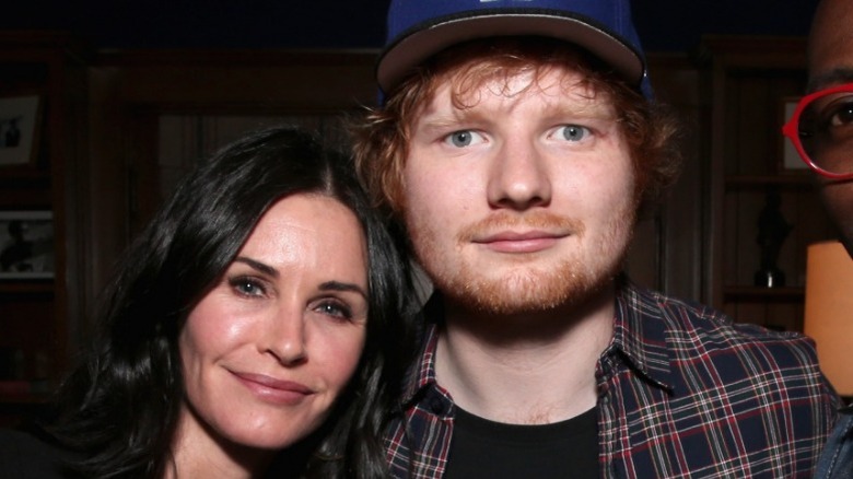 Courteney Cox posing with Ed Sheeran