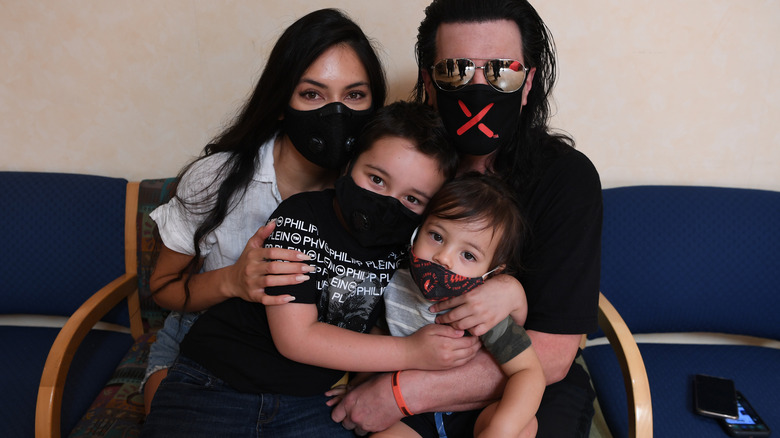 Shaunyl Benson and Criss Angel with their sons