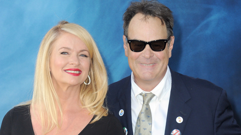 Donna Dixon and Dan Aykroyd smiling