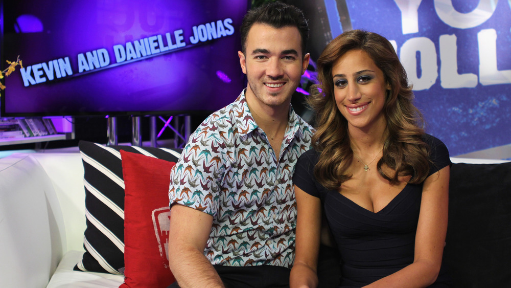 Kevin Jonas and Danielle Jonas smiling