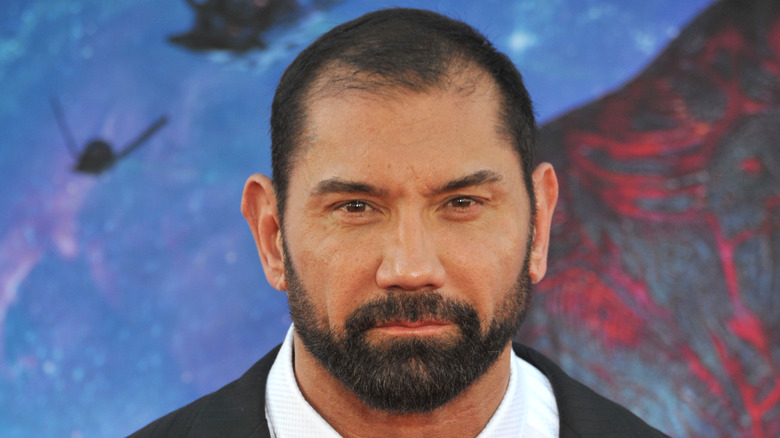 Dave Bautista in a suit