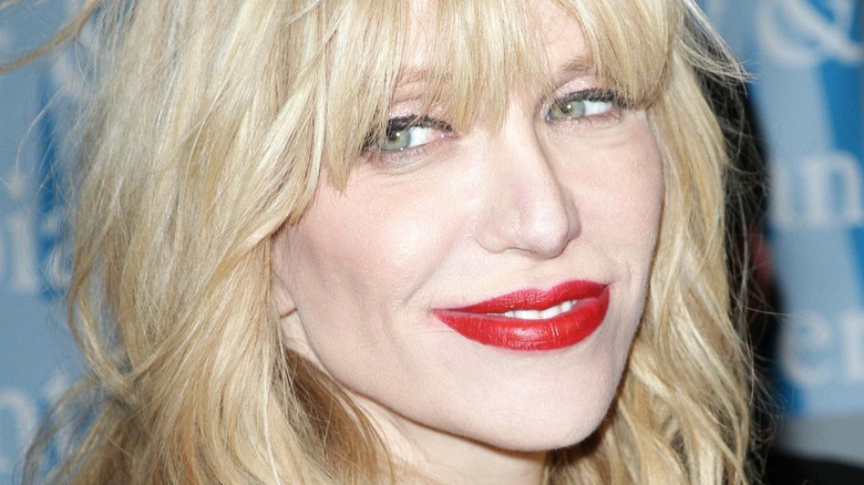 Courtney Love posing on the red carpet