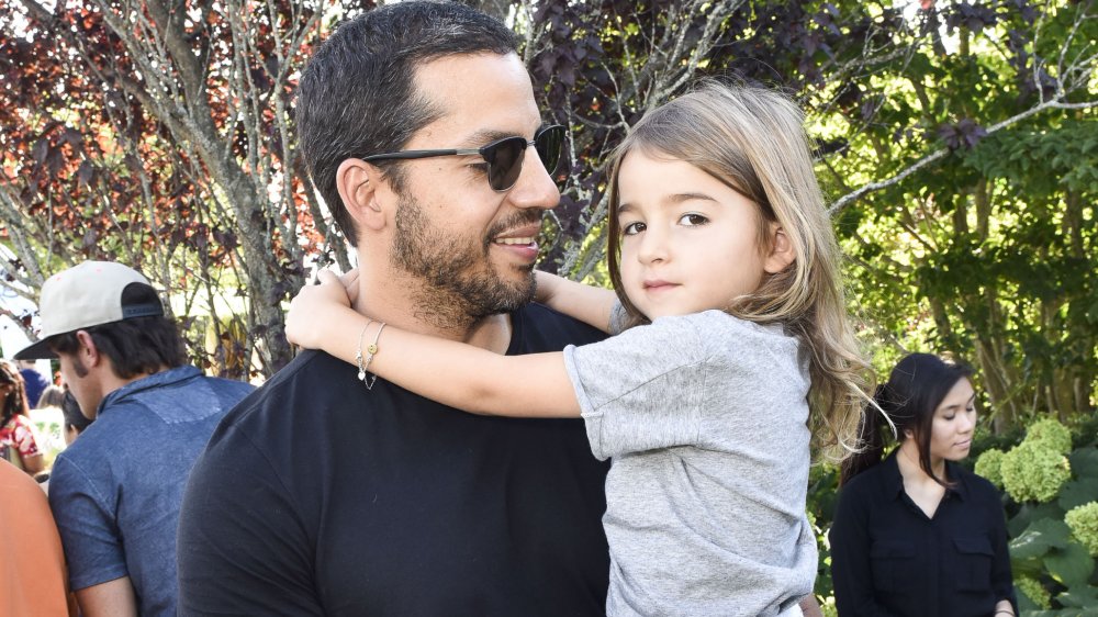 David Blaine holding up daughter Dessa Blaine