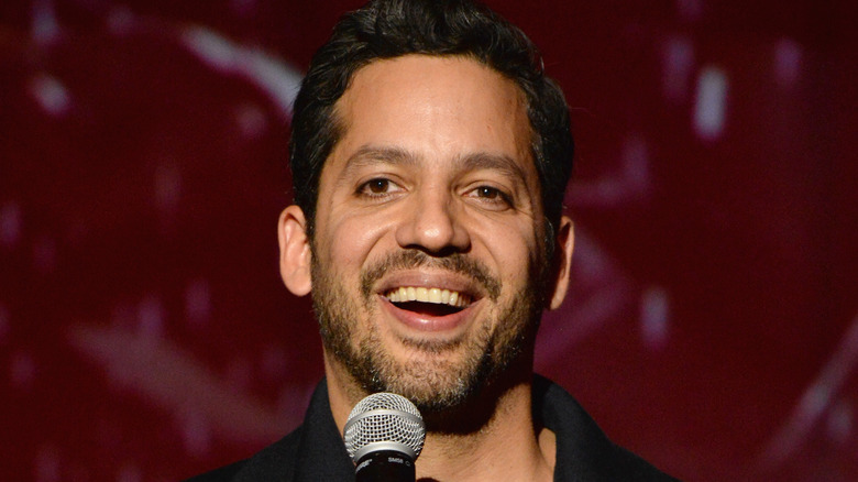 David Blaine speaking into microphone