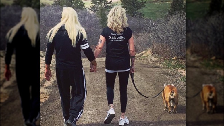 Duane Chapman and Francie Frane walking dog