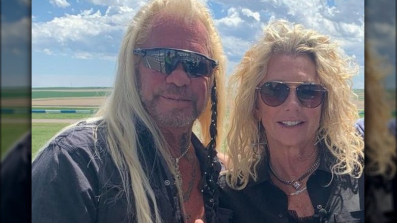 Duane Chapman and Francie Frane smiling outside