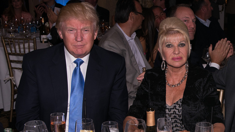 Donald Trump and Ivana Trump at a table