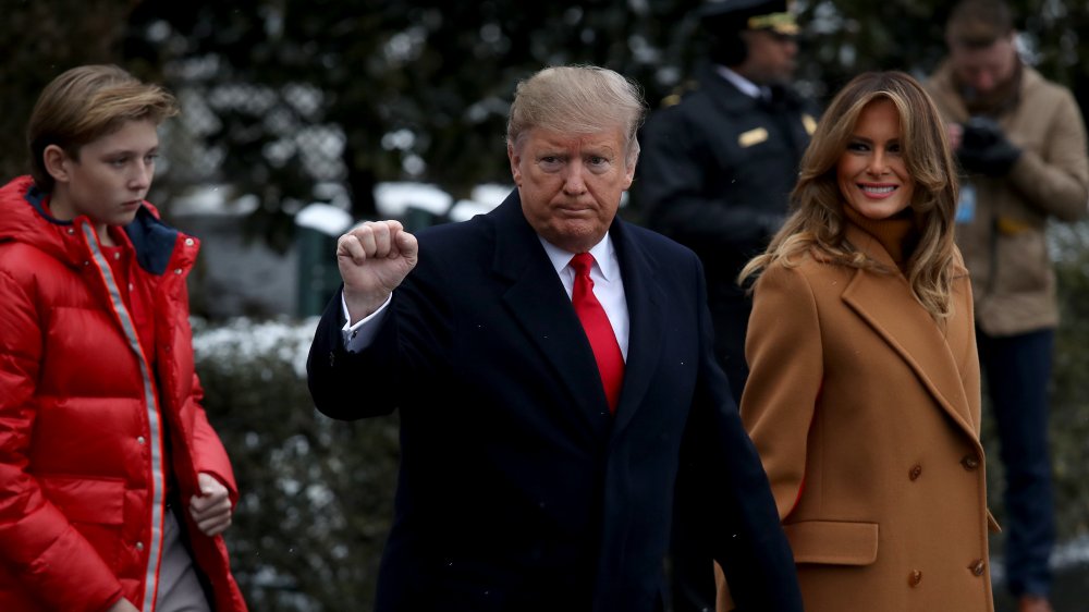 Barron Trump, Donald Trump, and Melania Trump