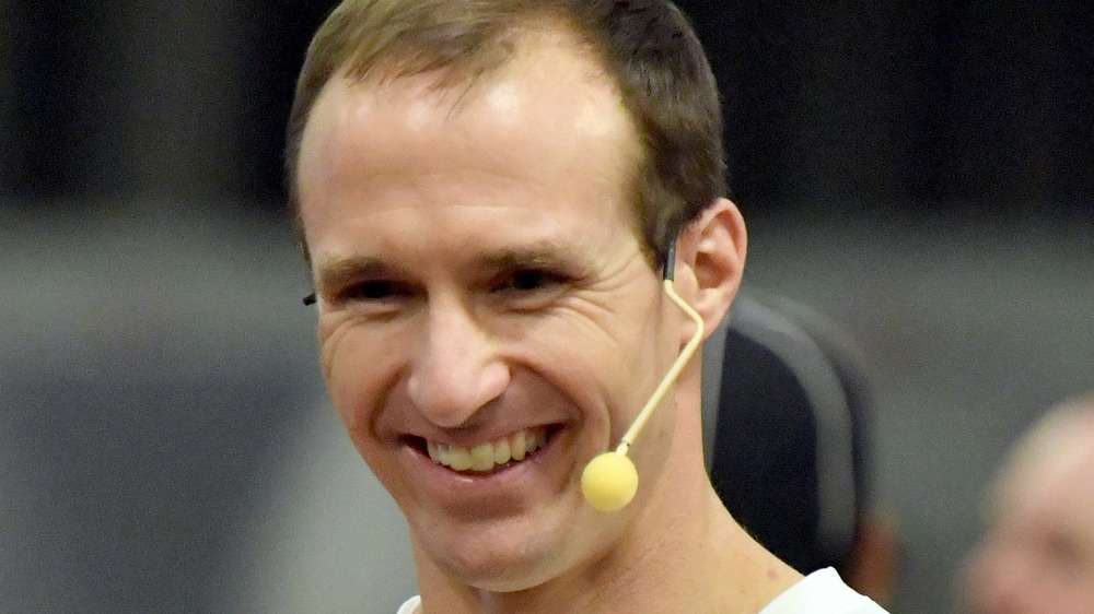 Drew Brees with microphone 