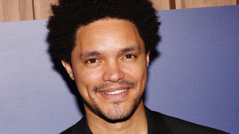 Trevor Noah smiling in 2022