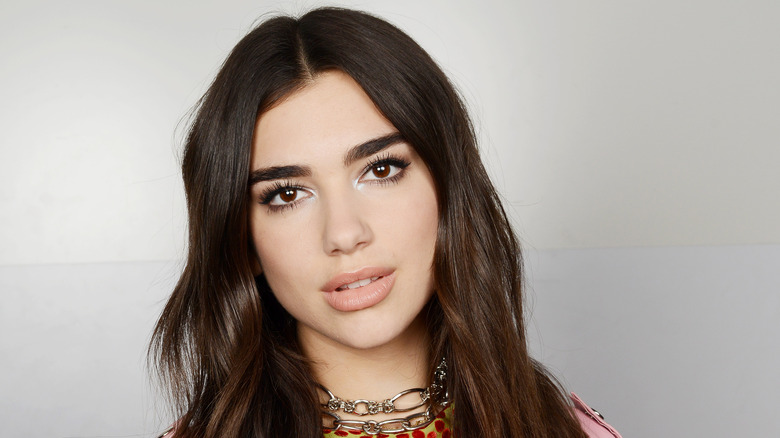 Dua Lipa gazing at camera