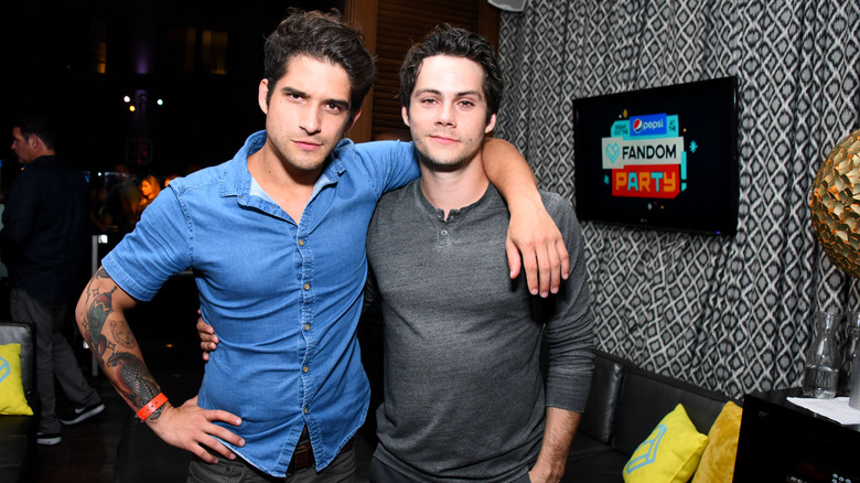 Tyler Posey and Dylan O'Brien smiling