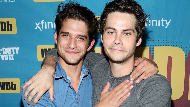 Tyler Posey and Dylan O'Brien smiling