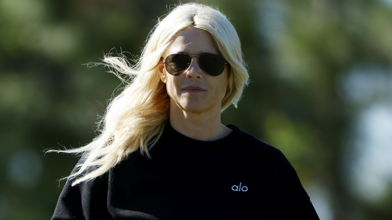 Elin Nordegren wearing aviator sunglasses